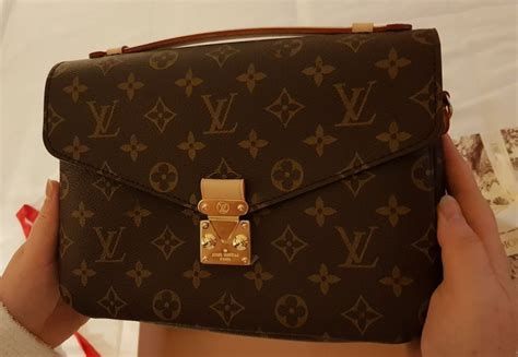 como diferenciar un bolso louis vuitton original|bolso Louis Vuitton original.